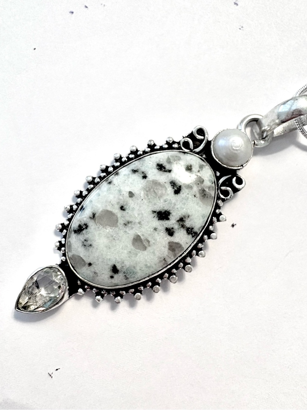 925 marked, kiwi Jasper,  White Topaz and Pearl pendant on a silver chain.